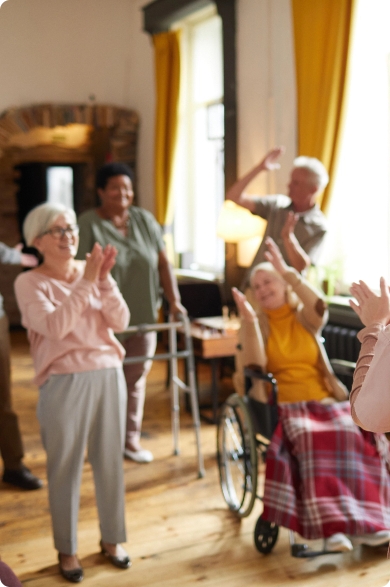 diverse-group-smiling-senior-people-dancing-while-enjoying-activities-retirement-home-with-you